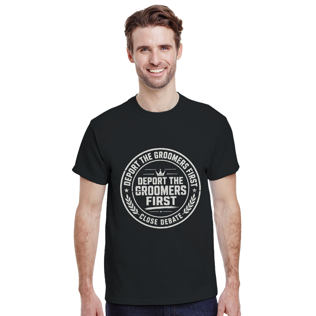 Model wearing the Deport The Groomers First slogan T-shirt in black, front