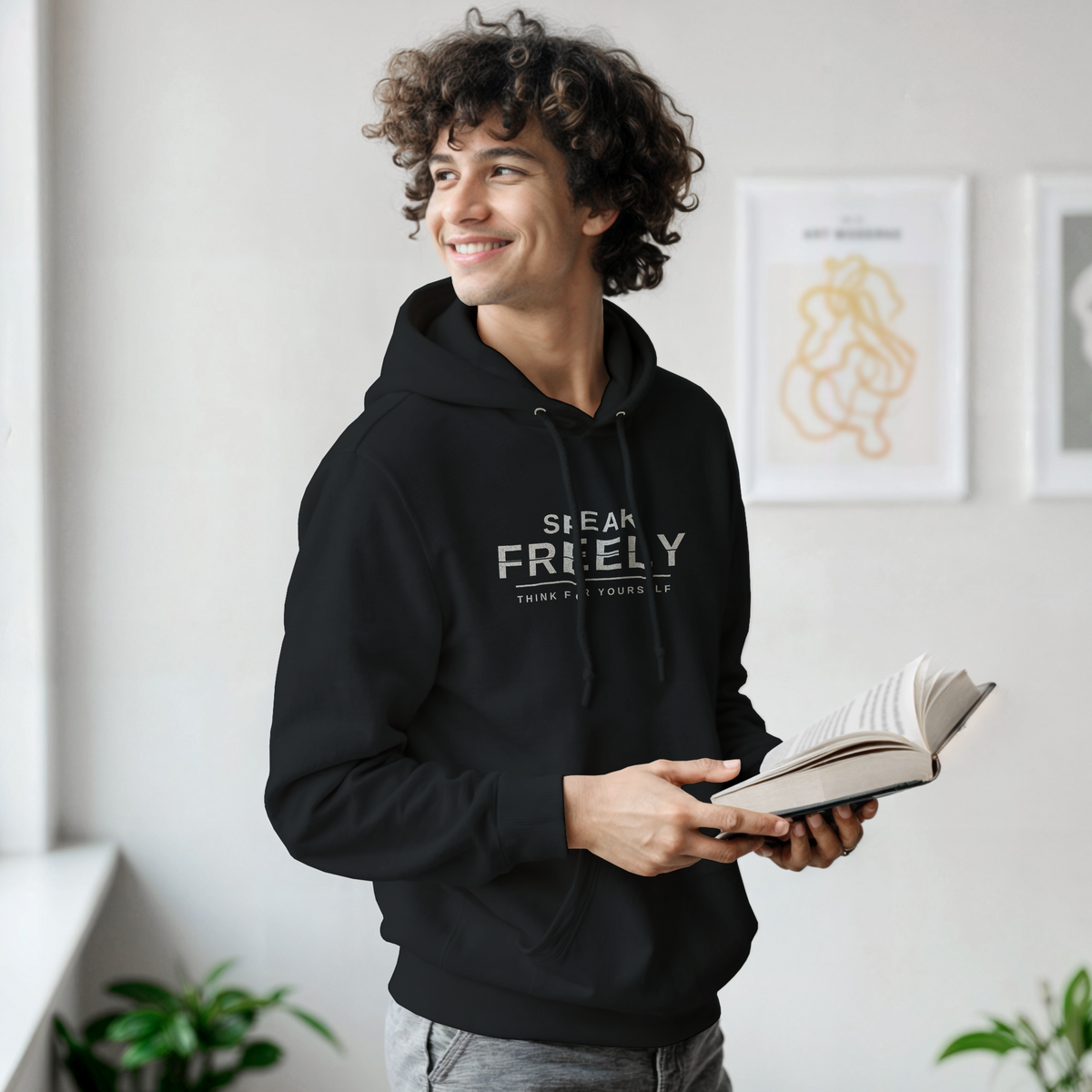 Speak Freely Hoodie – black hoodie, front print, worn